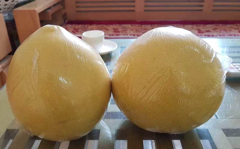Người tiêu dùng cẩn trọng với bưởi vàng nhẵn bóng, đích thị hàng Tàu